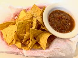 Mary and Tito’s Cafe signature dishes Chile Relleno PlateChips and SalsaChicharrones